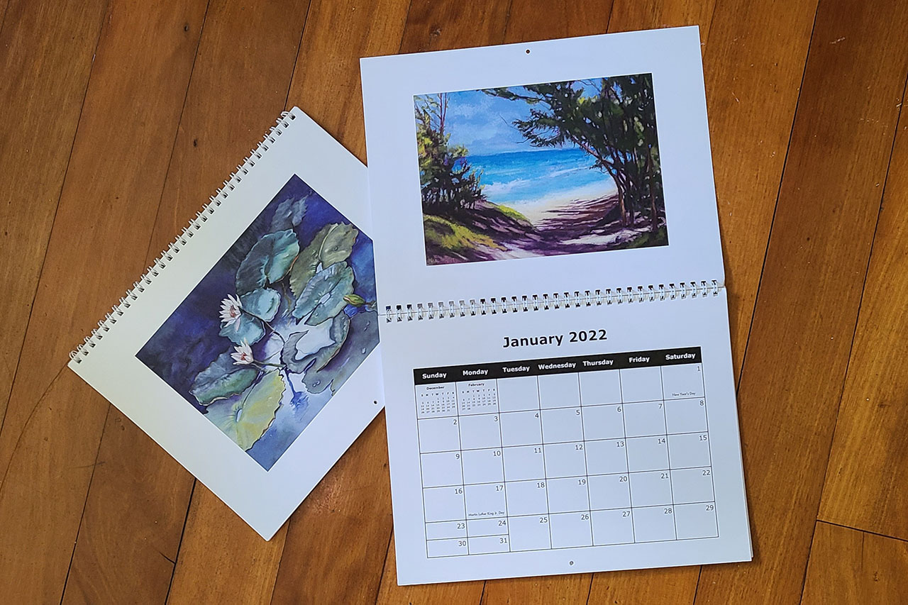 2022 art calendar with a different painting on each month by Maui artist Christine Waara